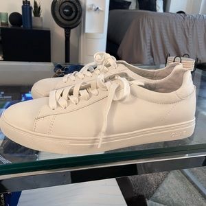White clae mens sneakers. Never worn.